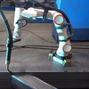 Magnetic cobot welding workstation